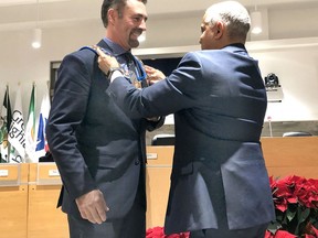 Grey County Warden Paul McQueen, left, receives the warden's chain of office in December 2019 from outgoing warden Selwyn Hicks, who McQueen defeated during last year's inaugural Grey County council meeting. 
Denis Langlois/The Owen Sound Sun Times/Post Media Network
