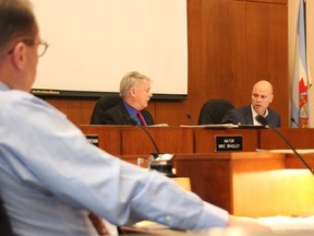Sarnia Coun. Bill Dennis, left, and Mayor Mike Bradley look on as CAO Chris Carter speaks at budget deliberations in council chambers Tuesday in Sarnia. Sarnia's budget for 2020 has been set at $154.9 million. Tyler Kula/Sarnia Observer/Postmedia Network