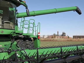 A combine harvester sits outside John Deere's Harvester Works facility in East Moline, Illinois, U.S. (REUTERS/Daniel Acker)