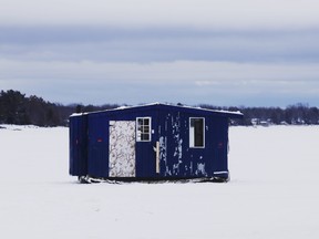 An ice hut is seen near the shores of Lake Nipissing by Sunset Park, New Year's Day. Michael Lee/The Nugget