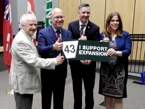 United Counties Warden Pat Sayeau, MPP Steve Clark, MP Michael Barrett and North Grenville Mayor Nancy Peckford show their delight at the County Road 43 funding announcement last July. (FILE PHOTO)
