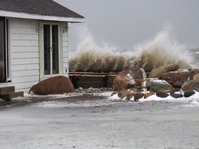 Southerly winds sent waves from Lake Erie crashing over the break walls of homes along Erie Shore Drive, in this file photo taken in January 2020. Ellwood Shreve/Chatham Daily News/Postmedia Network