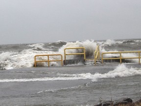 The high water level on Lake Erie contributed to strong winds being able to push waves over the pier at Erieau, Ont. on Saturday January 18, 2020. (Ellwood Shreve/Chatham Daily News)