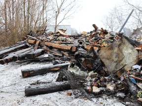 All that remains of the 250-year-old log house located at 3601 Highway 2, Gananoque, that burned to the ground on Jan. 24. (Lorraine Payette/For Postmedia Network)