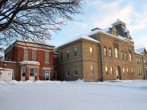 The two-storey redbrick former governor's house, at left, is attached to the historic old Grey County courthouse on 3rd Avenue East. Denis Langlois/The Owen Sound Sun Times/Post Media Network