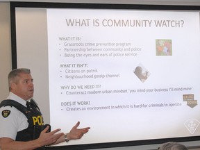 Upper Ottawa Valley Detachment commander Inspector Stefan Neufeld describes what a neighbourhood watch program is during a meeting to gauge interest in Pembroke about establishing such a program in the city.