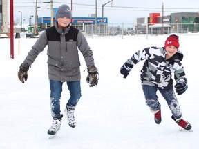 Mathew Laverdure and Seb Larocque are seen skating at the Hollinger skate path in January shortly after it opened last season. It will once again be in operation beginning on Christmas Eve.

RICHA BHOSALE/The Daily Press