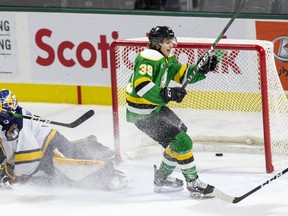 Max McCue of the London Knights celebrates after beating Erie Otters goalie Daniel Murphy for his first goal in the OHL during the third period of their game at Budweiser Gardens in London, Ont. on Sunday January 19, 2020.