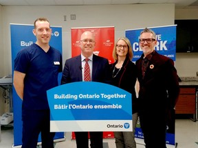 Nursing student Jordan McCann, left, MPP Steve Clark, president and CEO of Colleges Ontario Linda Franklin, and St. Lawrence College president Glenn Vollebregt pose during Friday's announcement. (SABRINA BEDFORD/The Recorder and Times)