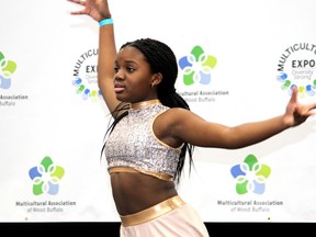 A girl dances at the Multicultural Expo at MacDonald Island Park on Saturday, February 8, 2020. Vincent McDermott/Fort McMurray Today/Postmedia Network