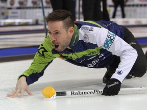 Skip John Epping of the Leaside Curling Club in Toronto throws a rock during the Ontario Tankard southern Ontario men's curling championship in Cornwall on Jan. 28. (Ian MacAlpine/The Whig-Standard)