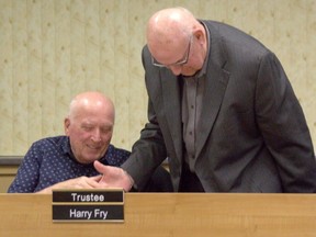 Trustee Al Bottomley congratulates Harry Fry on being appointed to the Near North District School Board in 2020. Bottomley pleaded with the Near North District School Board, Tuesday, to pass a motion to declare a climate emergency and asked his fellow trustees to take all necessary steps to make the school board fossil fuel free. The motion was deferred after much discussion and debate. 
Jennifer Hamilton-McCharles