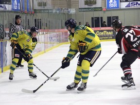 FILE - Spruce Grove Saints forward Jordan Biro looks for teammate Cole Basnett down low during the Spruce Grove Saints 4-1 win over the Camrose Kodiaks in the Conner Lukan and Parker Tobin Memorial Game on Friday.