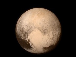 An image of Pluto captured by the New Horizons spacecraft.