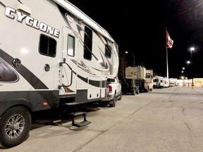 A line of recreational vehicles sits at the south end of a parking lot in this Postmedia file photo.