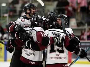 Chatham Maroons' Lucas Fancy (19) is congratulated after scoring in the third period against the LaSalle Vipers at Chatham Memorial Arena in Chatham, Ont., on Saturday, March 7, 2020. Fancy had a hat trick in the Maroons' 5-3 loss. Mark Malone/Chatham Daily News/Postmedia Network