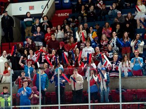 Clad in red and white, fans of St. Joseph's Catholic Secondary School Panthers rally during the 14th-annual Bishop Cup, on Wednesday March 11, 2020 in Cornwall, Ont. Robert Lefebvre/Special to the Cornwall Standard-Freeholder/Postmedia Network