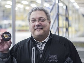 Whitecourt Wolverines head coach Gord Thibodeau shows off the game puck from his 833rd Alberta Junior Hockey League win at the Casman Centre in Fort McMurray Alta. on Friday February 3, 2017.  Robert Murray/Fort McMurray Today/Postmedia Network ORG XMIT: POS1702041922283655