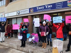 Workers and parents stand outside Fort McMurray-Wood Buffalo MLA Tany Yao's office to protest cuts the childcare workers on Tuesday, March 10, 2020. Laura Beamish/Fort McMurray Today/Postmedia Network