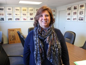 President Donna Mathewson is shown in the board room at the Sarnia-Lambton Real Estate Board.