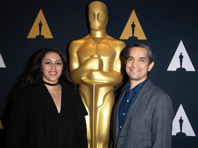 Smriti Mundhra, left, and Sarnia's Sami Khan, co-directors of the Academy Awards-nominated short documentary, "St. Louis Superman," attend an Oscars Week event earlier this year in Beverly Hills, California.
