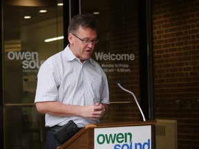 MPP Bill Walker outside of city hall on July 19, 2019. He announced the funding of two major road rehabilitation projects.