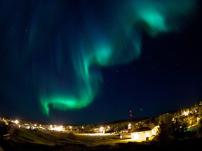 Northern lights fill the sky over Monument Hill in Fort Chipewyan, Alta. on September 13, 2013. Ryan Jackson/Postmedia Network