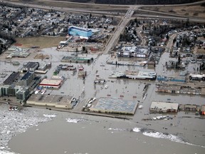 Flooded sections of downtown Fort McMurray as seen from the air on Monday, April 27, 2020. Supplied Image/McMurray Aviation