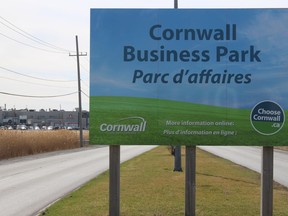 A Cornwall Business Park sign, with the Olymel plant in rhe background. Photo on Tuesday, April 7, 2020, in Cornwall, Ont. Todd Hambleton/Cornwall Standard-Freeholder/Postmedia Network