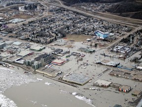 Flooded sections of downtown Fort McMurray as seen from the air on Monday, April 27, 2020. Supplied Image/McMurray Aviation