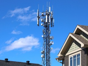 A cellphone tower near homes in Fort McMurray on Wednesday, April 29, 2020. Vincent McDermott/Fort McMurray Today/Postmedia Network