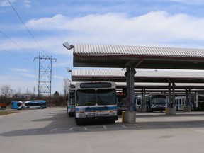 A steady stream of buses come in to the Kingston Transit yard to be sanitized for any COVID-19 contamination in Kingston, Ont. on Tuesday, April 7, 2020. 
Elliot Ferguson/The Whig-Standard/Postmedia Network