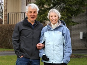 Kanji and Susie Nakatsu outside their Kingston home on April 17. They donated $1,000 to the Alberta government in March. (Ian MacAlpine/The Whig-Standard)