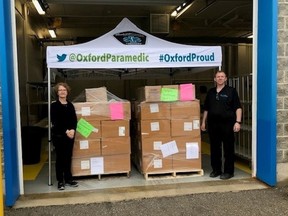 The first shipment of personal protective equipment from the province arrived in Oxford County on Monday, where local paramedics will handle the logistics of supply distribution. Pictured, Barb St. Clair and Jay Pember.  (Courtesy Oxford County Paramedic Services)