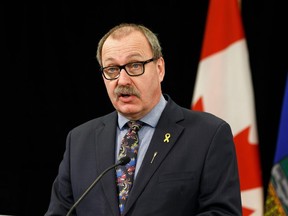 Minister of Transportation Ric McIver speaks during a COVID-19 coronavirus pandemic provincial briefing at the Federal Building in Edmonton, on Wednesday, April 1, 2020.