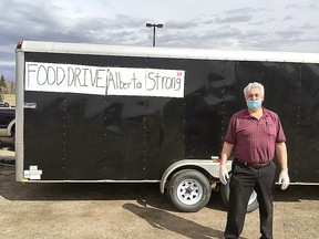 Real Chartrand of Spruce Grove poses with one of the supply trailers he recently ran up to Fort McMurray. The area resident previously lived in the community and lost everything during the fires that ravaged the region previously.