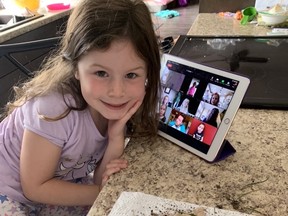 Valleyview kindergarten student Grace Edwards shows off the nest she made with her Zeom class is on in the background on the iPad.