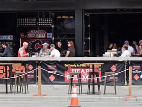 Lunch hour business was brisk at the Trolley 5 restaurant in Calgary on Monday, May 25, 2020. After about two months Calgarians can sit down again in restaurants with COVID-19 precautions. GAVIN YOUNG/POSTMEDIA