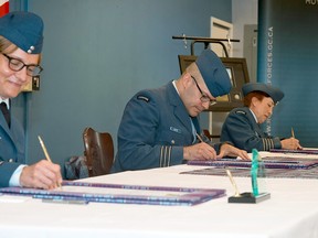 Corina Moore is invested as honorary colonel of 21 Aerospace Control & Warning Squadron, Friday at 22 Wing/Canadian Forces Base North Bay. Commanding officer Lt-Col Richard Jolette presided over the ceremony. 
Corporal Robert Ouellette Photo