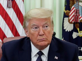 U.S. President Donald Trump is seated prior to signing an executive order regarding social media companies in the Oval Office of the White House in Washington, D.C., on May 28. (Jonathan Ernst/Reuters)