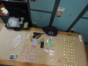 Grande Prairie RCMP have arrested two males, and seized drugs and weapons, following a lengthy investigation.