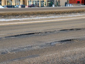 FILE — Potholes on Highway 16A in Stony Plain.