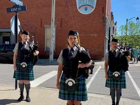 Members of the Paris Port Dover Pipe Band show their appreciation to the volunteers at the St. Vincent de Paul Soup Kitchen this past spring. Bernice Emery, Michelle Black and Deborah Vos played for the 45 minutes that meals were being served downtown Simcoe.