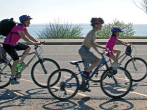 Cyclists enjoy the warm weather at the Kate Pace Way along the North Bay waterfront. 
Mackenzie Casalino/The Nugget