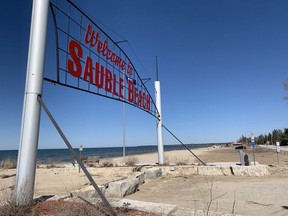 The iconic sign at Sauble Beach is seen earlier this spring in this file photo.
 (Postmedia Network)