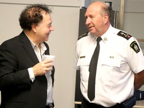 Sault Ste. Marie Police Services Board member John Bruno speaks with Chief Hugh Stevenson at JUMP office at Station Mall in January. BRIAN KELLY
