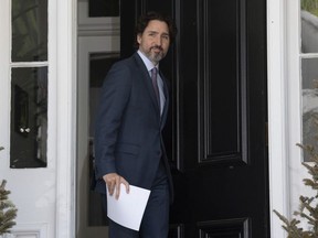 Prime Minister Justin Trudeau steps out of Rideau Cottage for a news conference in Ottawa, Wednesday May 27, 2020.