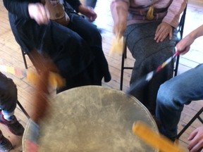 A drumming circle at M'Wikwedong's former location. SUPPLIED