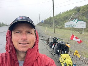 Arie Hoogerbrugge pauses for a selfie just outside the Sudbury's's eastern limit. SUPPLIED