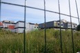 Pioneer Place remains unfinished and covered in tarps behind Hythe and District Pioneer Homes in Hythe, Alta. on Sunday, July 21, 2019. The Government of Alberta now plans to demolish this site in favour of a new 75-space continuing care facility down the road.